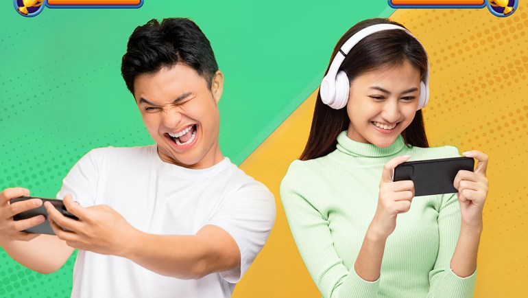 Friends enjoy a match of Pokemon Unite on their mobile phones.